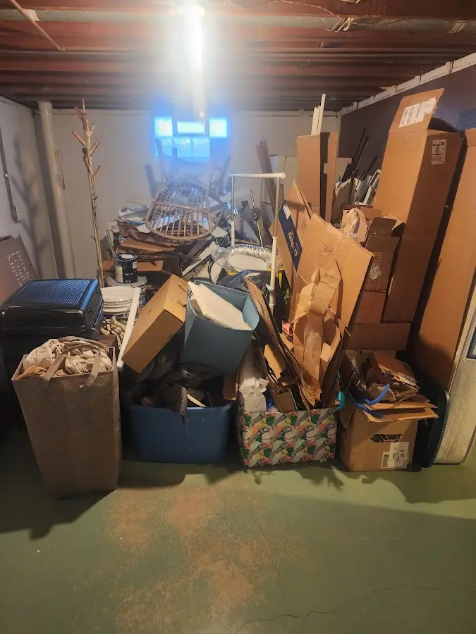 Roll-off dumpster container at job site for 20 Yard Dumpster Rental in Evansdale